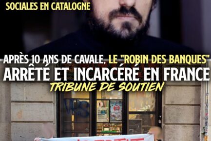 Enric Duran, actuellement emprisonné par la justice française, et ses soutiens portant une banderole qui réclame sa libération.