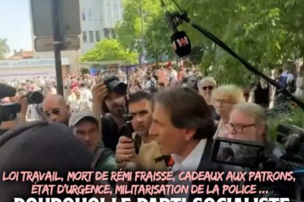 Jérôme Guedj, entouré de micros, se fait virer de la manifestation parisienne du 1er Mai car le PS est un parti de traîtres.