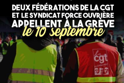 Un gilet jaune et un gilet rouge de la CGT se tiennent côte à côte lors d