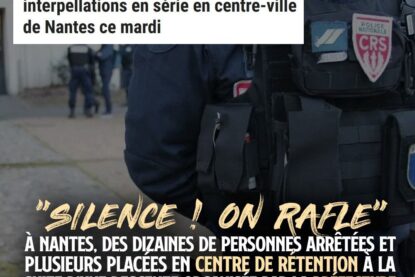 Un CRS monte la garde pendant un contrôle d
