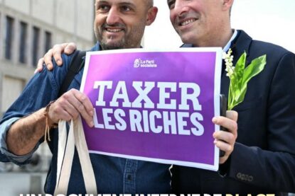 Raphaël Glucksmann et un militant du PS tiennent une pancarte "taxer les riches" pour le 1er Mai : le summum de l